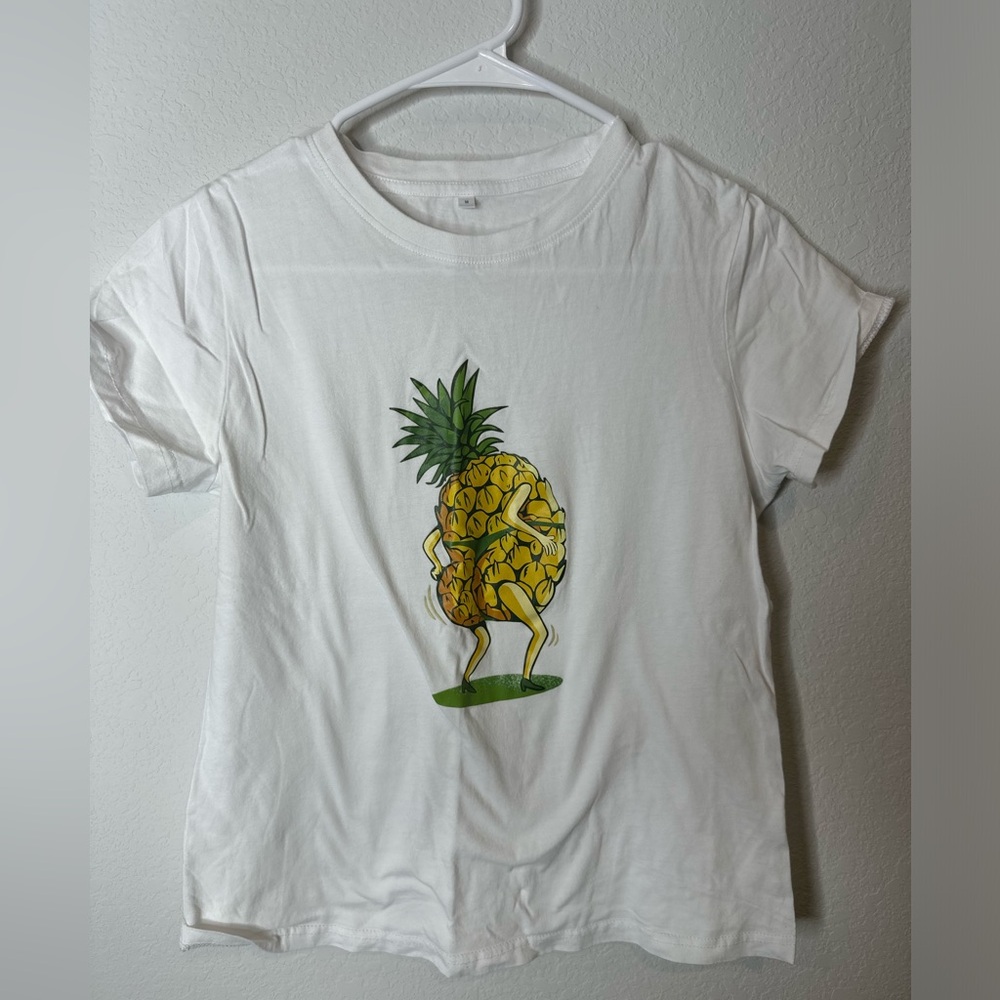 Women’s white pineapple shirt. Size M.
